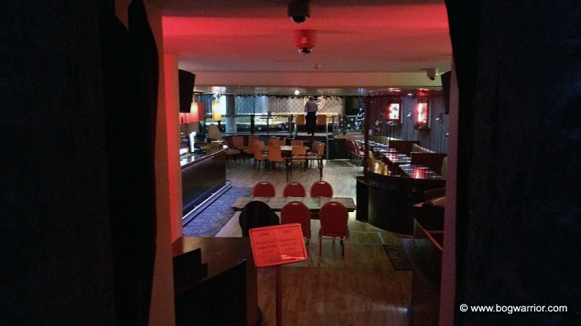 Second bar on the floor underneath the main bar