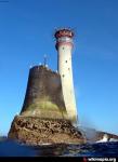 The stump of Smeaton's tower, with its replacement lighthouse in the background