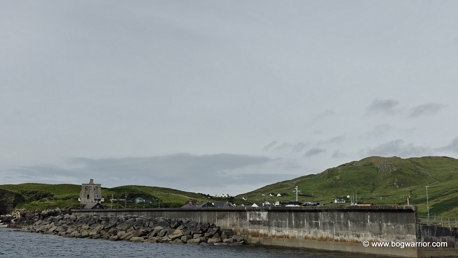 Clare Island pier, overlooked by Granuaile's Castle
